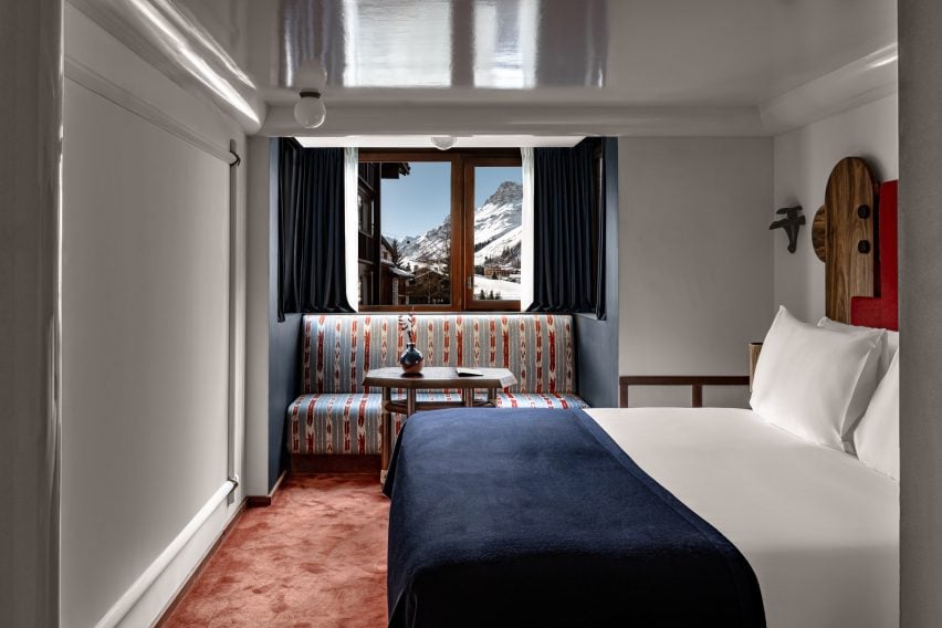 Hotel bedroom with ikat print banquette